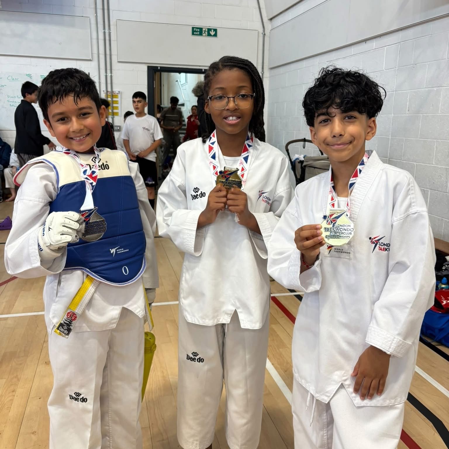 Three young Sparks students with their London Taekwondo Interclub Championships medals